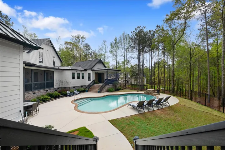 A private staircase off the pool deck provides access to the apartment.