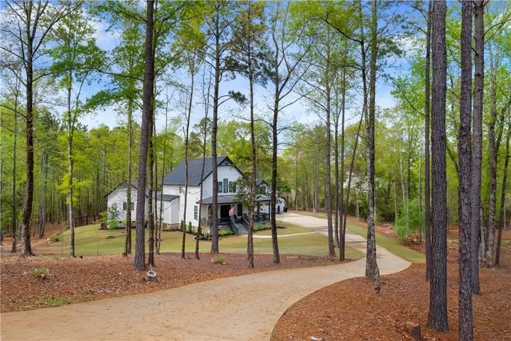 A winding drive creates a beautiful entrance.