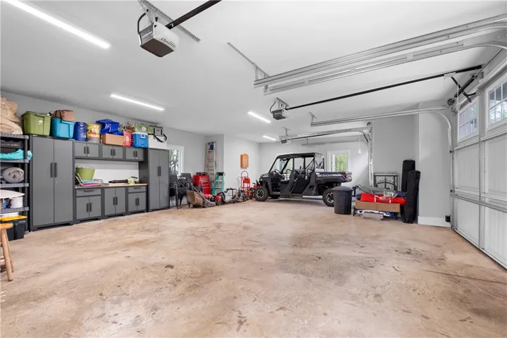 A three-car garage with generous storage space.