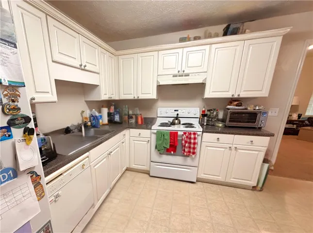 Lovely Large Kitchen - Photo Edited to Remove Items Not Material to Property