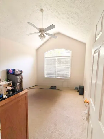 Bedroom 2 with Cathedral Ceiling - Photo Edited to Remove Items Not Material to Property