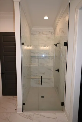 Curbless tile/glass shower with seating.