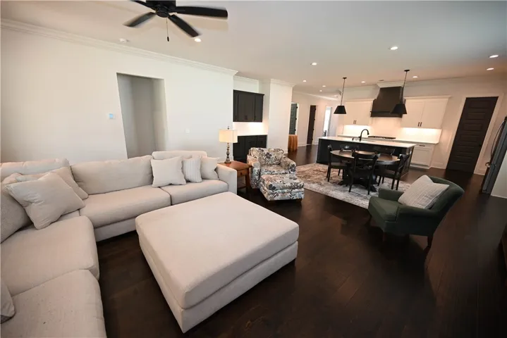 Open living room leads to kitchen.