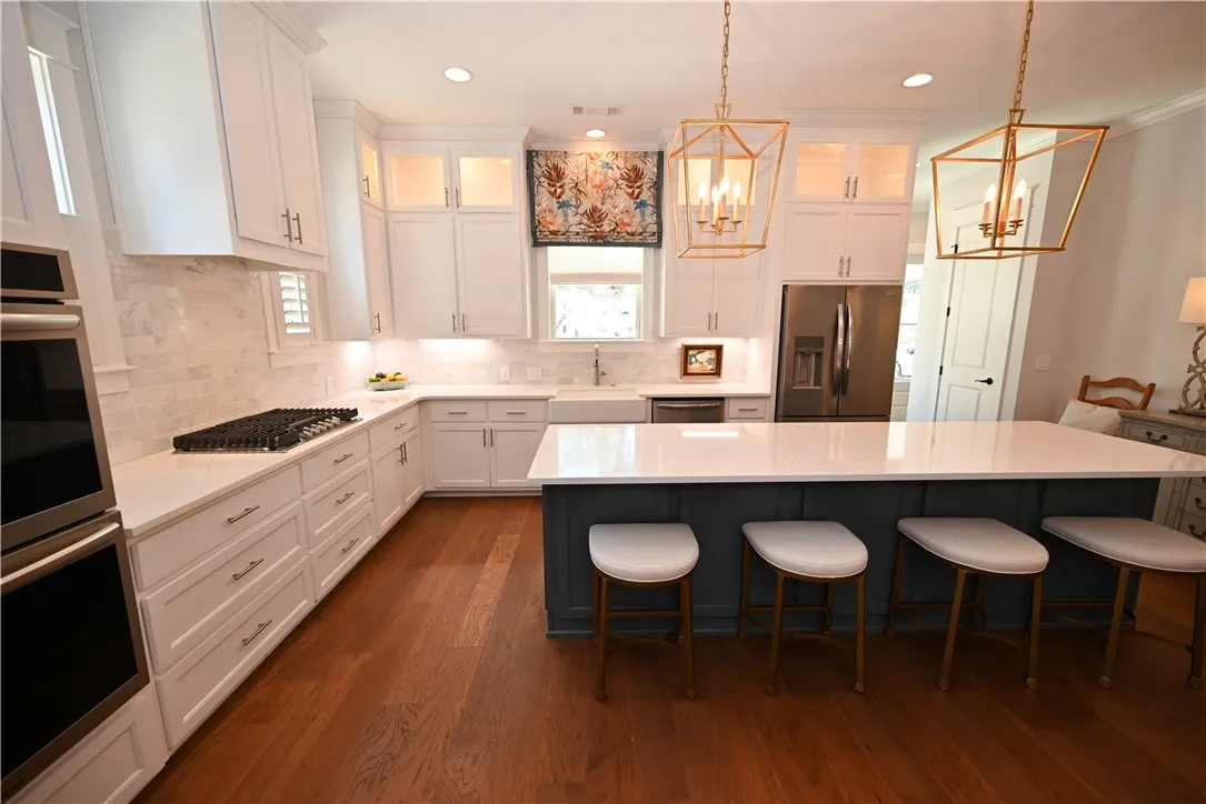 Beautiful white and gold layout with blue accents.