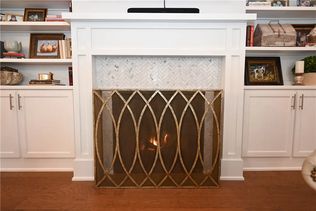 Finished with a gas log fireplace.