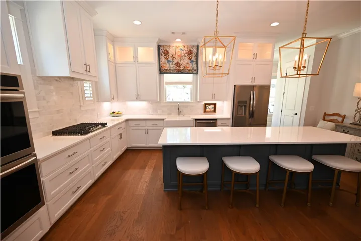 Beautiful white and gold layout with blue accents.