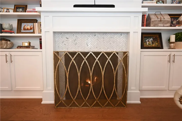 Finished with a gas log fireplace.