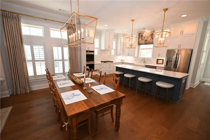 Open floorplan flows into the the dining room and chef's kitchen.