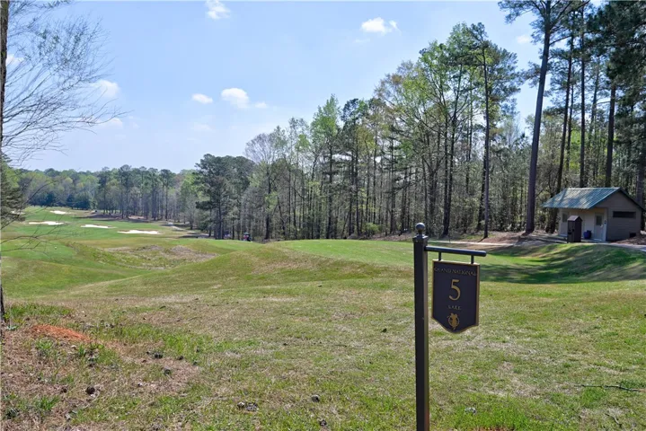 Nestled along the Grand National golf course in National Village!
