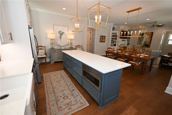 Large center island with a built in microwave.