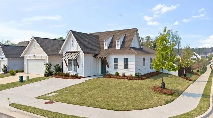 Spacious corner lot; sidewalks throughout neighborhood.  (Grass has been virtually enhanced to resemble spring!)