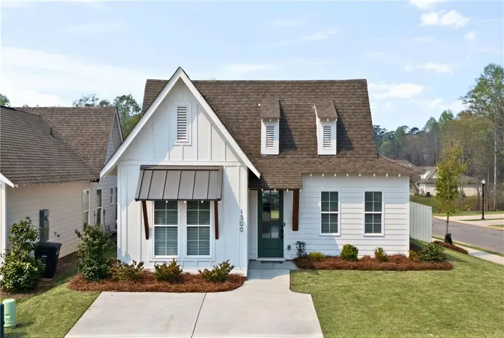 Front elevation of this Tate A.  (Grass has been virtually enhanced to resemble spring!)