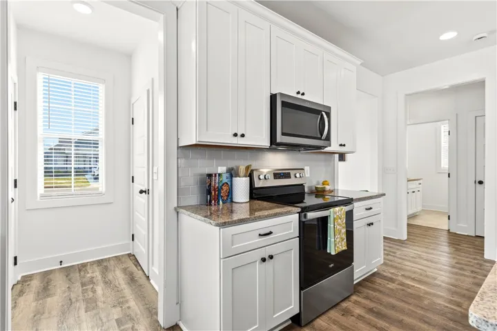 Also around the corner is the private laundry room.