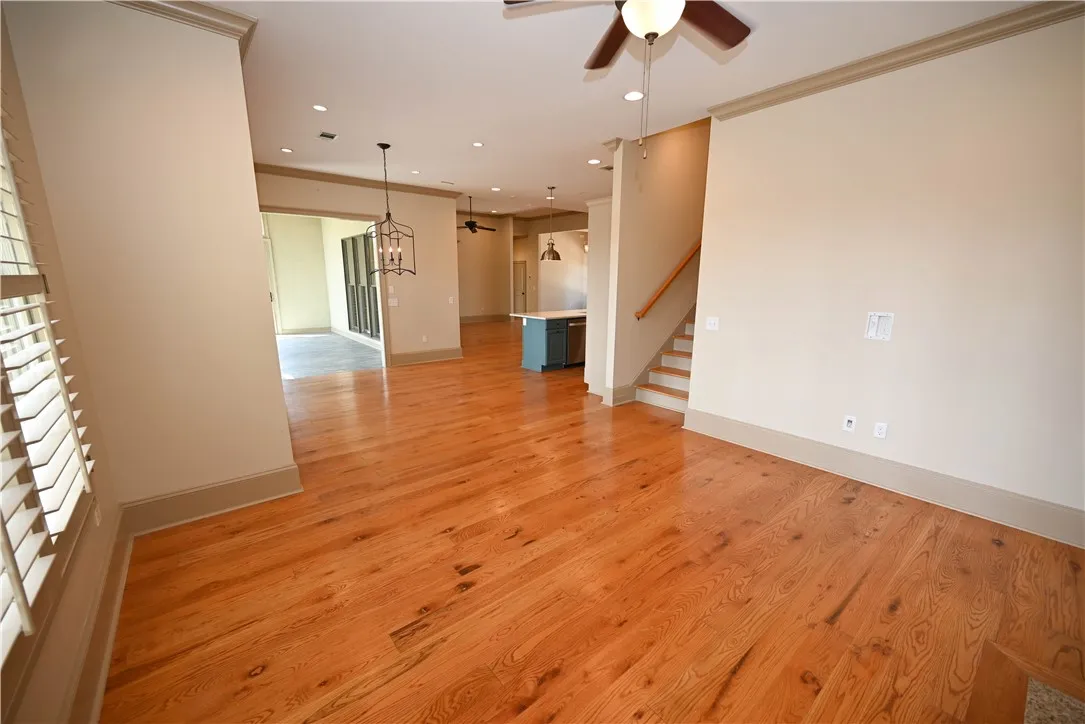 Second living area leads upstairs.