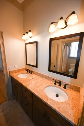 Jack and Jill bathroom with double vanity shared between bedroom 2 & 3.
