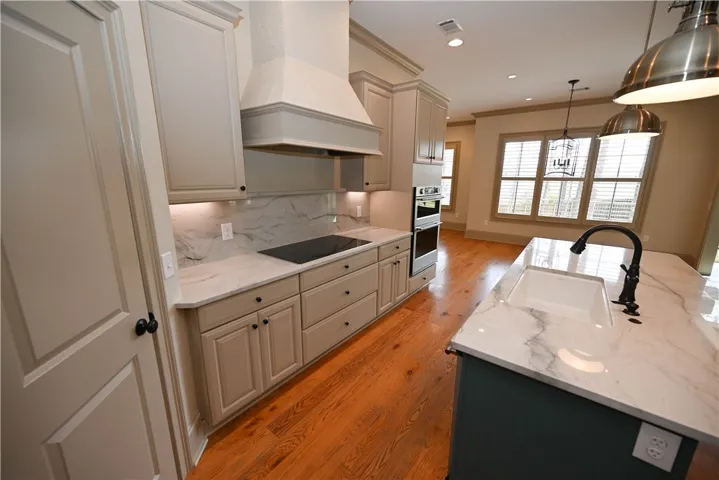 Quartz countertops with a huge island and sink!