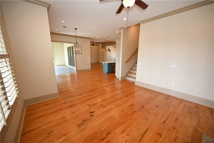 Second living area leads upstairs.
