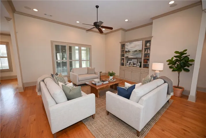 Inviting living room at the entrance (DIGITALLY STAGED)