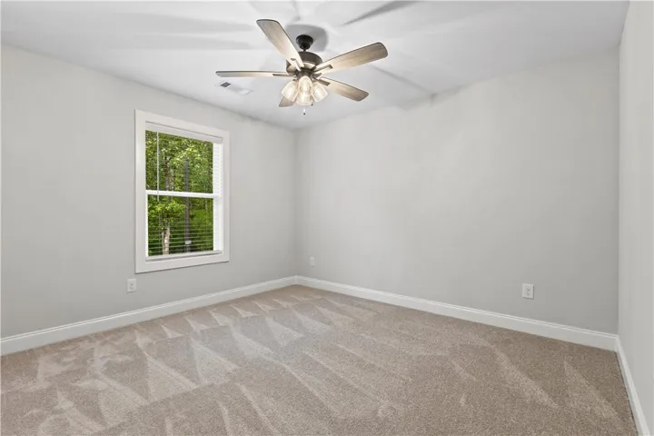 This spacious room provides a blank canvas, ready for your personalized touch.