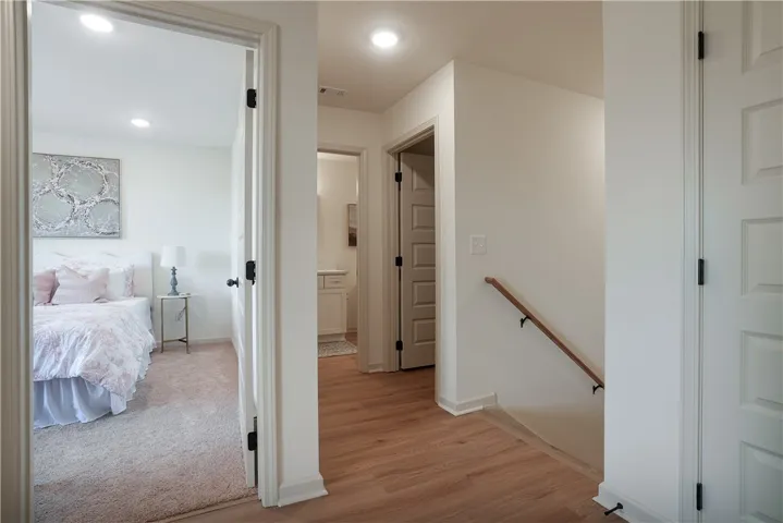 3 remaining Bedrooms all upstairs with Full Bathroom & extra Storage - Example of a completed & staged Ellie Plan