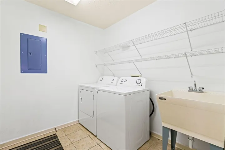 Laundry room with a sink