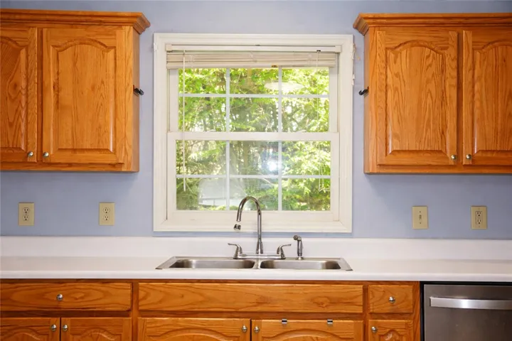 Window over the sink overlooking the backporch