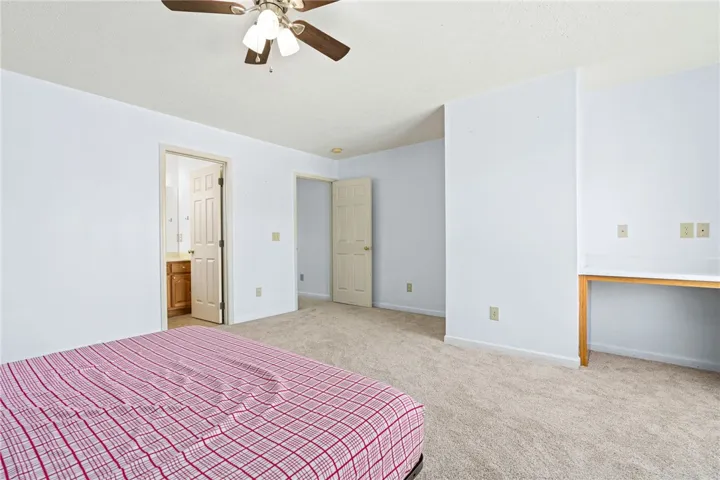 Bedroom with a built-in desk