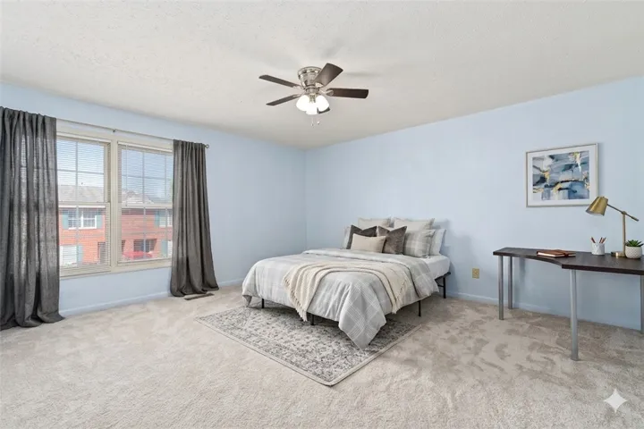 Large primary bedroom -virtually staged