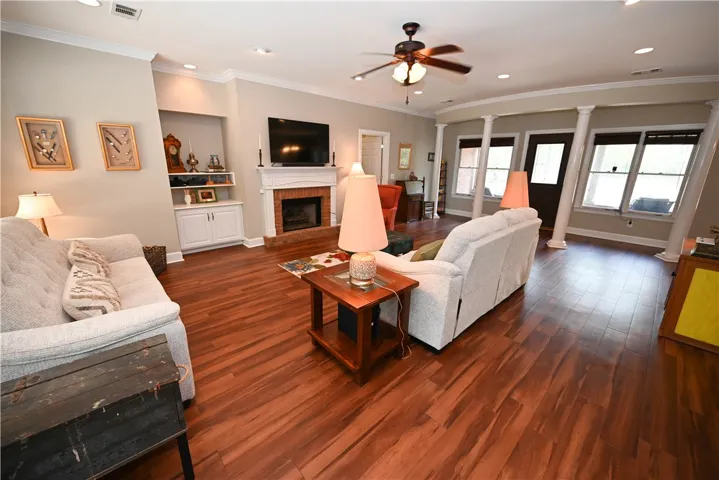 Built-in bookcase adding character next to the fireplace.