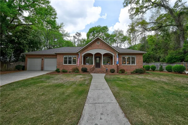 Paved walkway and driveway.
