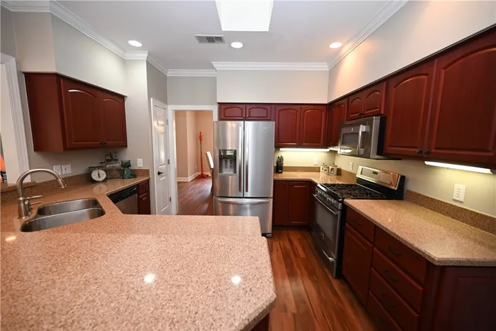 Kitchen finished with under cabinet lighting.