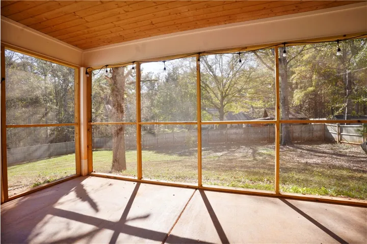 Covered & Screened In Back Porch with Fireplace - just off the Living Area