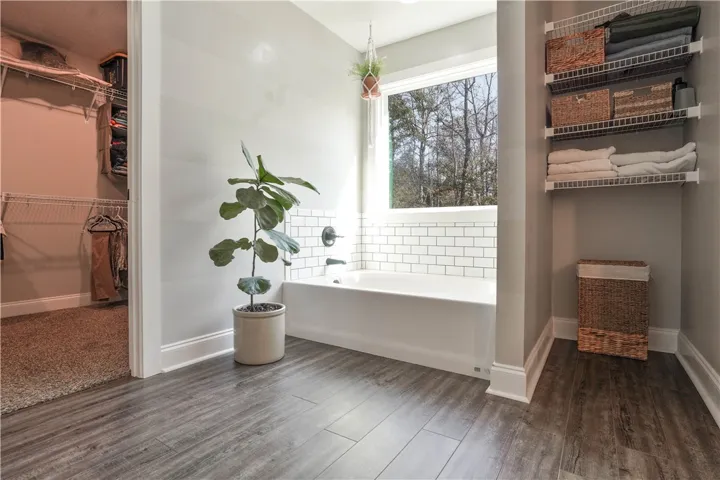 So much space in this Primary Suite!  Double Vanity, Linen Storage, Private Water Closet, Walk-In Closet, Soaking Tub & Walk-In Shower