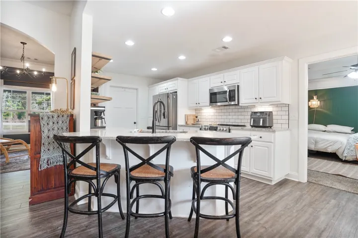 View Of Island with Bar Seating - just off Primary Bedroom & Dining Area