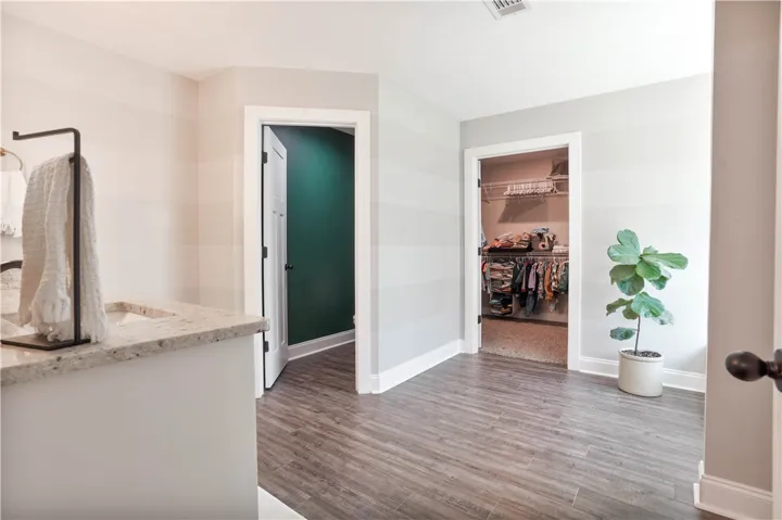 So much space in this Primary Suite!  Double Vanity, Linen Storage, Private Water Closet, Walk-In Closet, Soaking Tub & Walk-In Shower