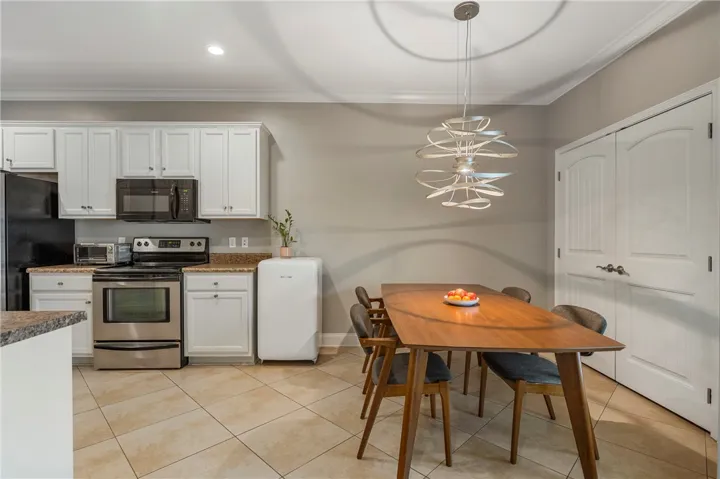 The Kitchen has the most fabulous lighting fixture. The Washer & Dryer will remain in the laundry closet.