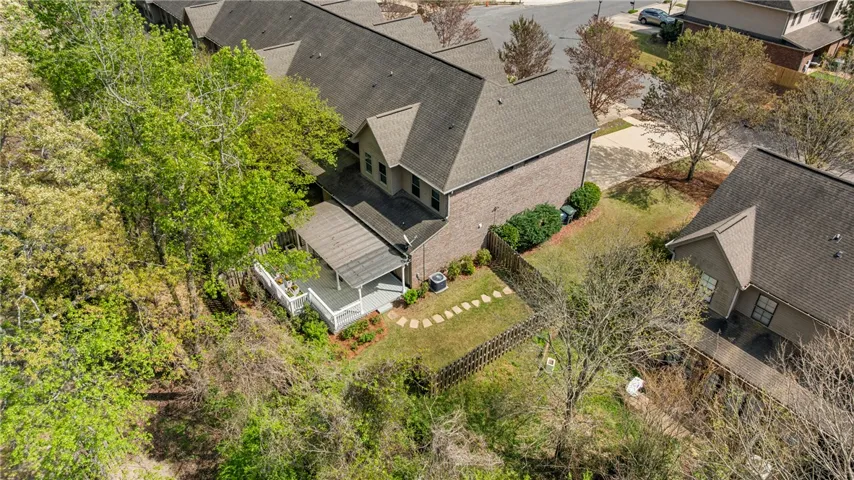 From this aerial , you can see the size of the fenced yard and the flagstone path