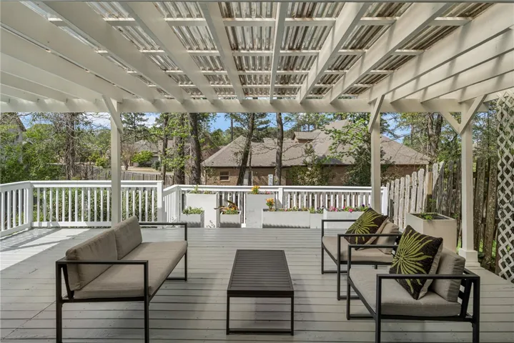 The planters are absolutely perfect and they will remain with the home. You can see a pond view from the back deck.