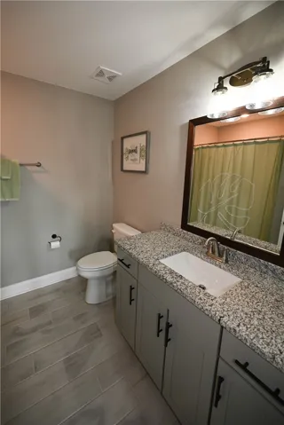 Bathroom 2 with extended vanity & tub/shower combo