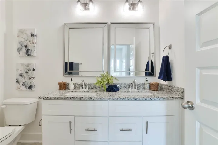 Photo is an example of a completed Camellia Duette. All plans, pricing and specifications are subject to change without notice.