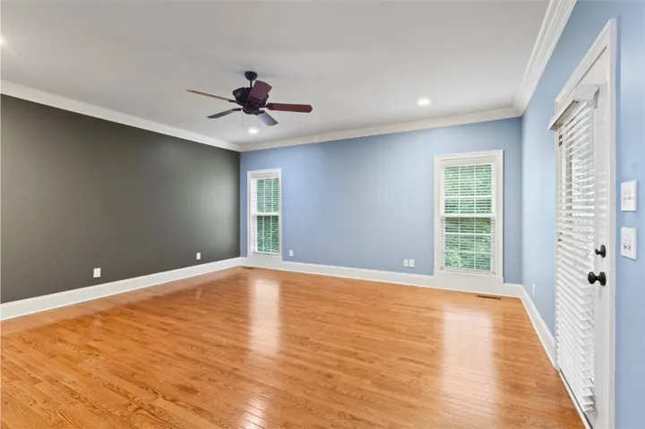 Primary Bedroom leads to the screened in porch