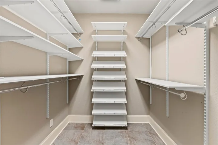 Solid Shelving in primary closet