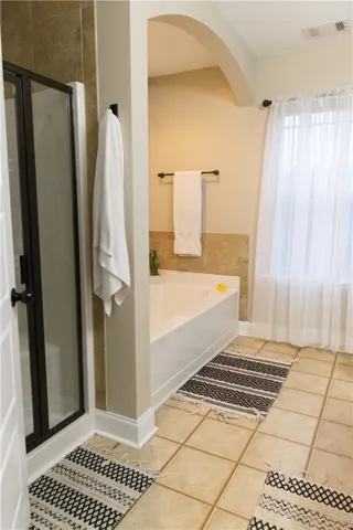 Primary Bath with 6 foot Soaker Tub and Sep. Shower