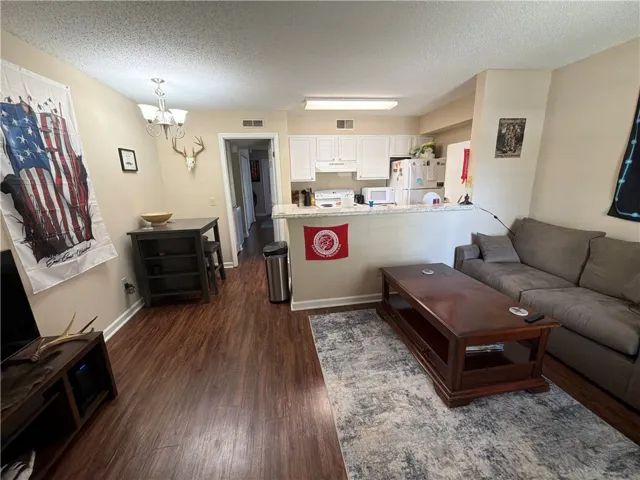 Living Room into Kitchen on an Updated Unit