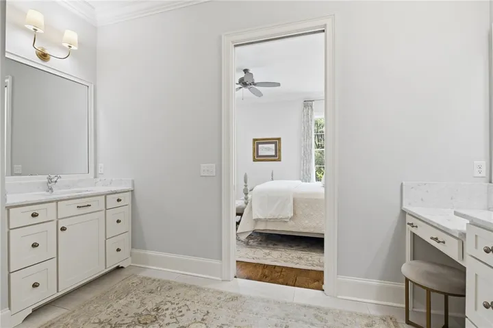 Opposing vanities in the primary bath offer residents a space of their own.