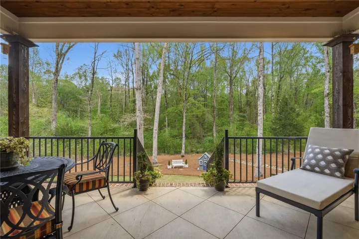With an uninterrupted view of the land beyond, the porch is a serene extension of the home.