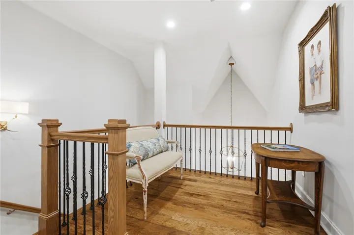 The second-floor landing overlooks the foyer.