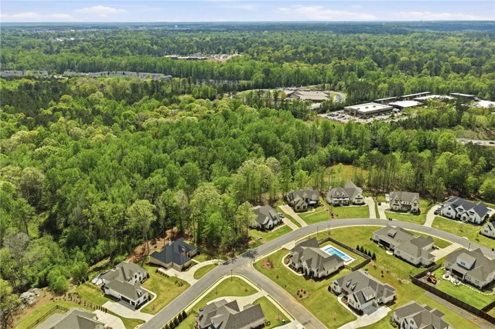 With Upper Saugahatchee Creek beyond, the property enjoys serene, undeveloped views.