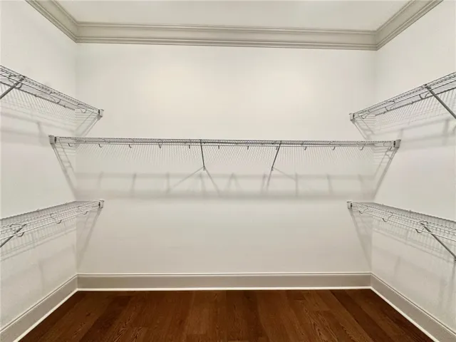 The spacious primary closet is conveniently located just off the primary bath.