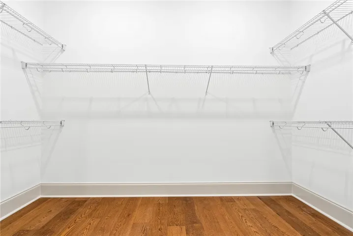 The spacious primary closet is conveniently located just off the primary bath.